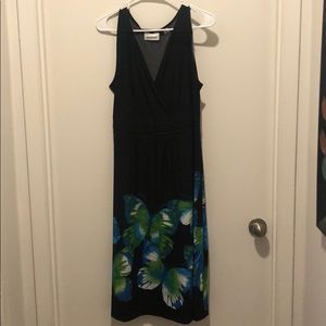 Sleeveless dress with butterfly print.
